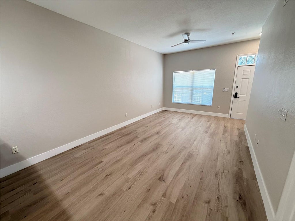 Photo of 2200 San Vittorino Circle #104, Kissimmee, FL 34741 (MLS # O6453529)