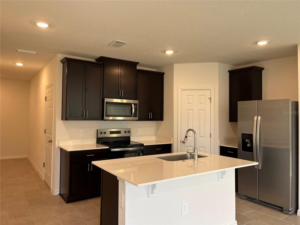 Photo of 16277 Bird Of Paradise Avenue, Clermont, FL 34714 (MLS # O6451271)