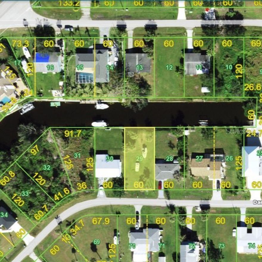 Build your waterfront getaway on this saltwater canal lot in Port Charlotte, offering boating access just MINUTES TO OPEN WATER, with NO HOA FEES! While the lot is more modest in size, it presents a great opportunity for someone looking to enjoy the waterfront lifestyle without the maintenance of a larger property. Ideal for a cozy custom build, this location puts you right where Florida living shines. Need a builder? Let us introduce you to reputable local builders. Conveniently located near US-41 and I-75, you’re just minutes from Fishermen’s Village, Sunseeker Resort, Lashley and Gilchrist Parks, and historic downtown Punta Gorda, known for its fine and casual dining, shopping, and live entertainment. Plus, world-class Gulf beaches are only a short drive away.