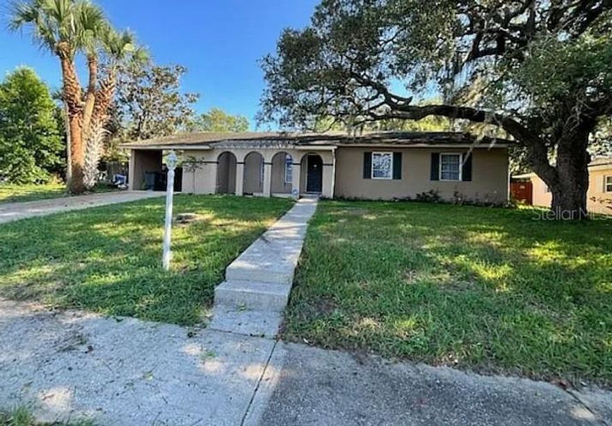 Beautifully updated Spring Hill Home, No HOA or Flood insurance here.  Conveniently located off US-19 and Spring hill Dr, in a Pet-Friendly community with its own Private Pool Back Yard Oasis. This Completely Renovated 2025-2026 is a well maintained 3-bedroom, 1-1/2-bath home features a covered carport with additional space for storage, front porch, and front patio courtyard entry area. Step inside to the lovely living room that looks out to the lanai built in Pool area, Luxury Vinyl Plank flooring throughout. The entire interior and exterior have been freshly repainted. All 3 large bedrooms have spacious closets for ample storage. The fully remodeled kitchen features soft-close shaker cabinets, granite countertops, new appliances, and recessed lighting. The dining area/breakfast nook is filled with natural light from the large 8 foot sliding door overlooking the patio and pool area offering a pleasant view. The screened in-enclosed lanai complete with sliding doors and a pass through window, provides a perfect year-round space. Step outside to the rear patio for outdoor enjoyment. Both baths updated with new vanities, recessed lighting, and comfort-height toilets. Major updates include New Roof, Upgraded Electric panel, interior/ exterior lighting Enjoy resort-style living with pools, schools, Golfing, restaurants, shopping and many amenities nearby. Parks, Beaches, Boating, Festivals, Concerts ETC. and activities and more! Close to Tampa Airport (40 minutes), Orlando (90 minutes)