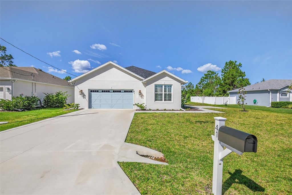 Photo of 41 La Mancha Drive, Palm Coast, FL 32137 (MLS # FC313686)
