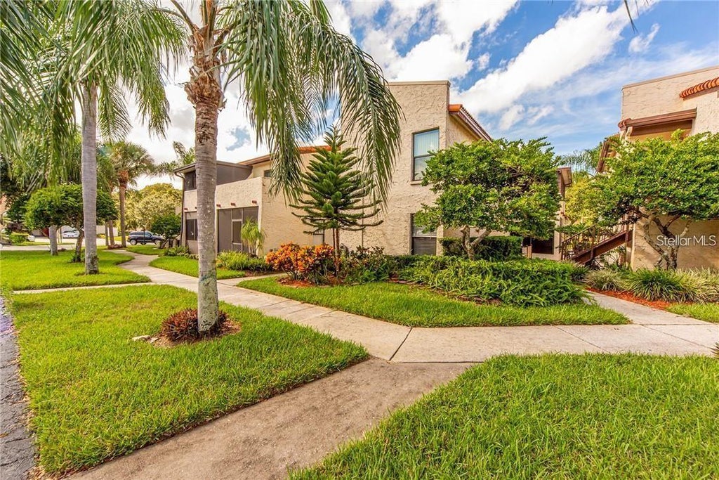 Photo of 2571 Cyprus Drive #1-104, Palm Harbor, FL 34684 (MLS # TB8510432)