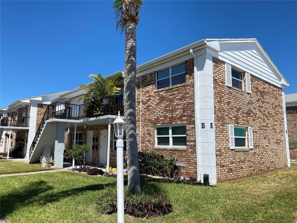 Photo of 190 E Olmstead Drive #E-11, Titusville, FL 32780 (MLS # V4946198)