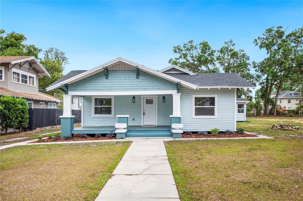 Photo of 717 Frank Lloyd Wright Way, Lakeland, FL 33803 (MLS # L4952765)