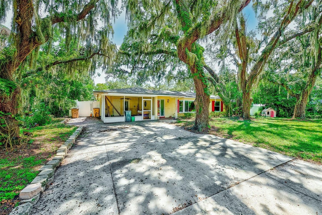 Photo of 303 Saint Augustine Avenue, Temple Terrace, FL 33617 (MLS # TB8549458)