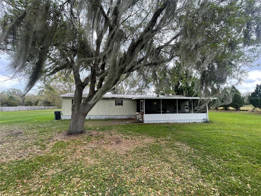 FL living at an affordable price or great investment property!  These 2 BD/1.5 BA homes is situated on 0.94 acres.   Short distance to all shopping, schools, medical facilities, and restaurants. Make this your new winter retreat or year around home. Call today, don't miss this great investment opportunity.