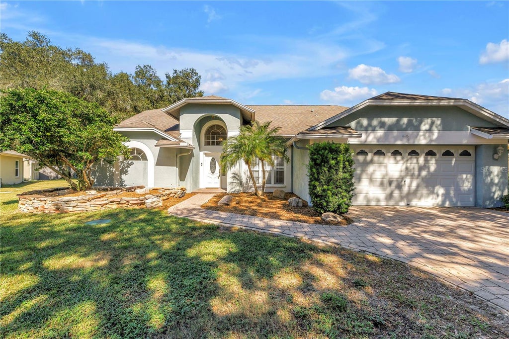 Photo of 18520 Sunward Lake Place, Lutz, FL 33549 (MLS # TB8561301)