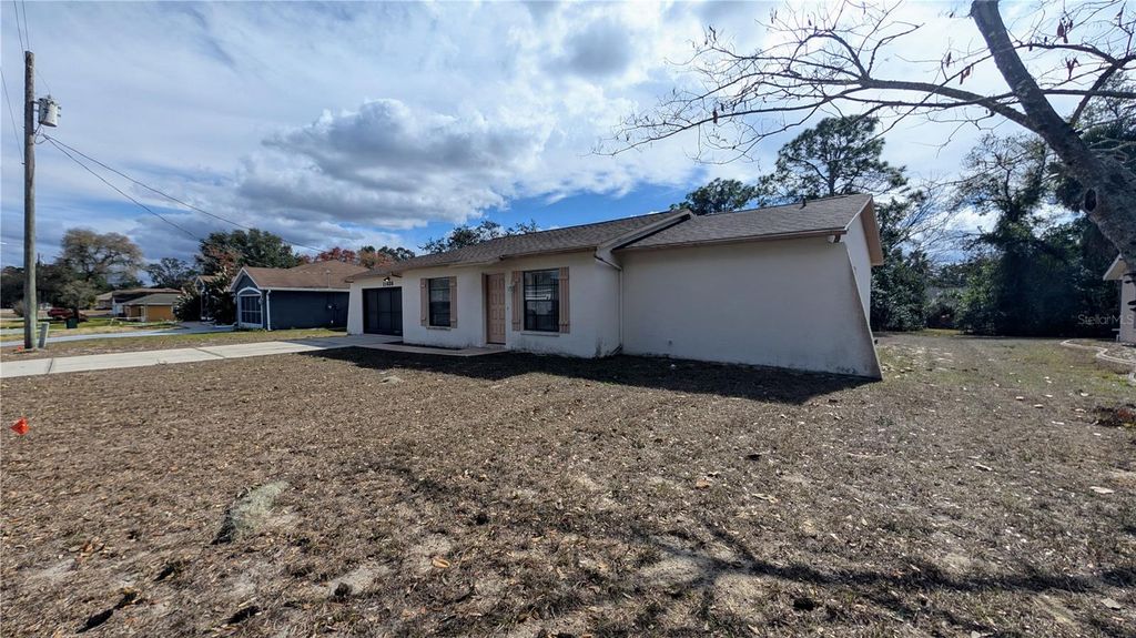 Photo of 11438 Palomar Street, Spring Hill, FL 34609 (MLS # TB8468362)