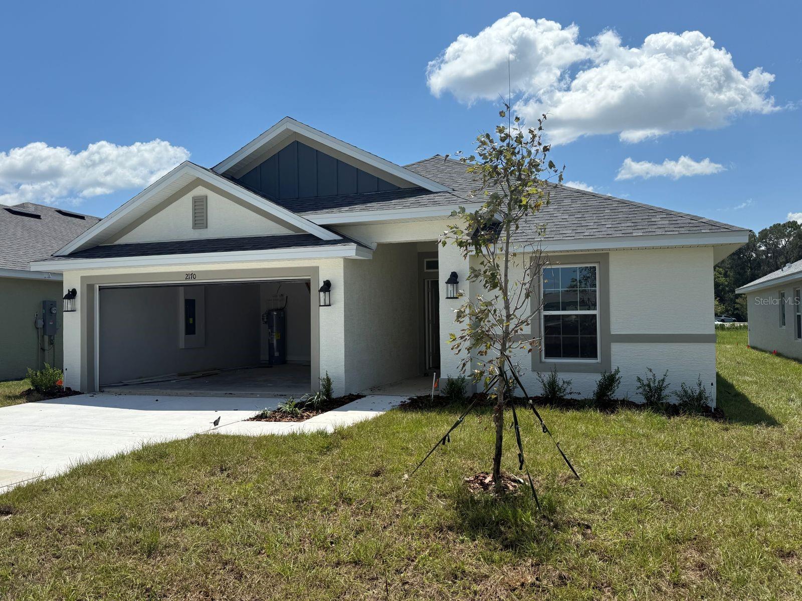 Under Construction. Brand new 1635 sq ft, 4 bed / 2 bath home in a community with nature park/trails nearby, easy access to I-75 and close to Ocala historic district, shopping, and dining. Estimated completion is September. This home features tile in the wet/entertainment areas and carpet in the bedrooms. Home also has granite countertops and shaker cabinets in the kitchen and bathrooms. Kitchen has a stainless steel range, microwave and dishwasher. Owner's bathroom has a large 5 foot wide tiled shower. Home also has TAEXX in-wall pest control system and a Builder Warranty. Community Center opening soon with pool, fitness center, community room and playground!! THIS HOME QUALIFIES FOR A LOW INTEREST RATE BUYDOWN WHEN BUYER CLOSES WITH A SELLER APPROVED LENDER AND SIGNS A CONTRACT BY SEPTEMBER 7, 2025. INTERIOR PICTURES ARE FROM SIMILAR HOME WITH SAME FLOORPLAN; OPTIONS AND COLORS MAY VARY.
