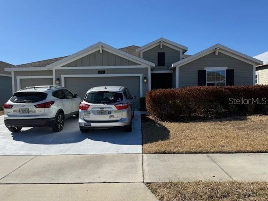 This is the one! You cannot get this type of living square footage built in this community anymore and the list of amenities within the community and home is impressive. Beginning with your Executive Series, 4BR/3BA/3-car GA home with 2,599 sq ft of living space, snuggled on a private street in the Storey Creek community. This E-series home features an open concept, Flynn floor plan that provides 17xl7 tile flooring throughout the home (excluding bedrooms) while presenting quartz countertops in all wet areas. The luxurious kitchen includes all stainless steel appliances, a timeless backsplash, oversized mahogany cabinetry extending to a built in sitting area within your breakfast nook. The home continues to offer excellence providing recess lighting throughout while being fully prewired for smart home capability. The split floor plan offers comfort and separation with 3 full bathrooms allowing your guests separate living quarters. Your home also provides a stunning Master Suite capable of fitting a separate sitting area with 2 walk-in closets and a luxurious master bathroom complete with an extraordinary walk-in shower. This home is the one you were thinking of when you considered upsizing and upgrading. The home also offers luxury community amenities such as a fully-equipped fitness center, clubhouse, resort-style swimming pool, tennis courts, trails, dog park and playground. Positioned in a desirable location with easy access to major Florida highways, shopping, amazing eateries and plazas. All you have to do is move in.