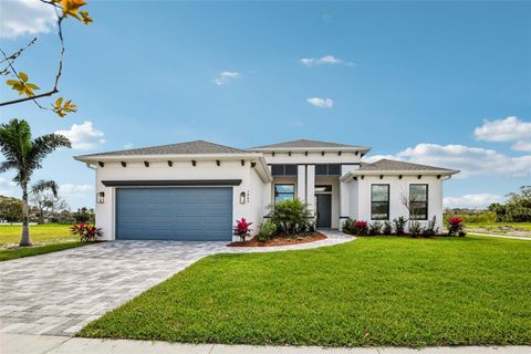 Photo of 1445 Windchime Lane, Melbourne, FL 32935 (MLS # O6293529)