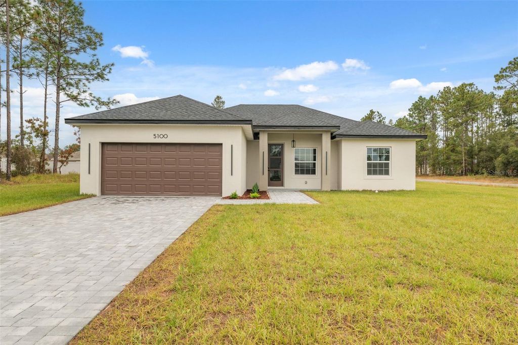 Photo of 5100 SW 155th Loop, Ocala, FL 34473 (MLS # O6359608)