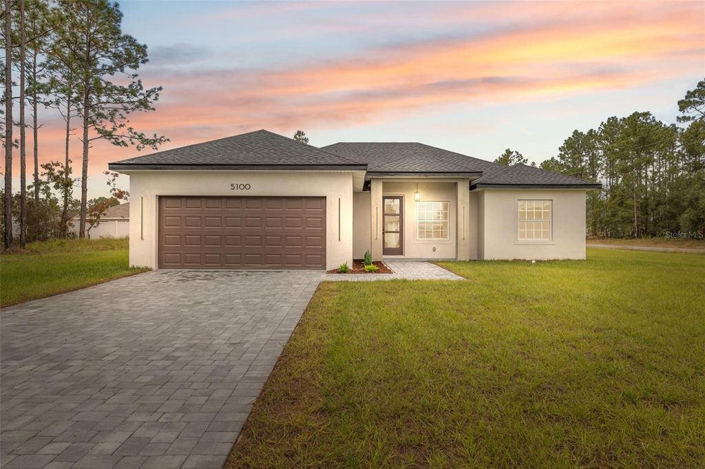 Photo of 5100 SW 155th Loop, Ocala, FL 34473 (MLS # O6359608)