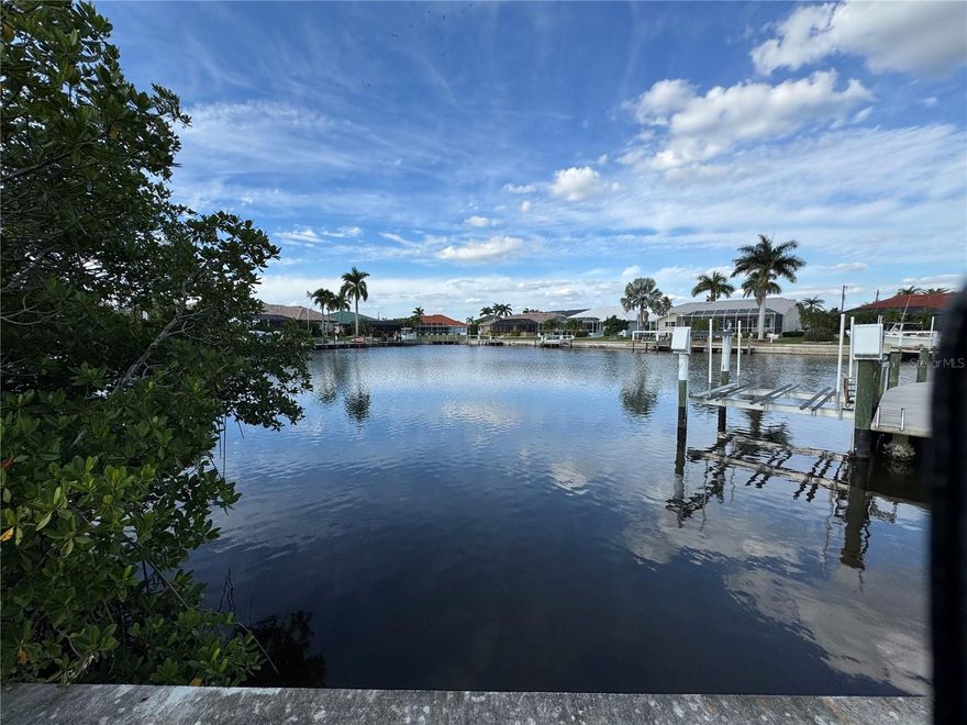 WATERFRONT LOT IN PUNTA GORDA ISLES! Sailboat water, just minutes to Charlotte Harbor! Build the Custom Home you’ve always imagined on this cul-de-sac lot. This property showcases a gorgeous wide-basin view along a deep-water, sailboat-access canal—offering quick, direct access with no bridges, and provides generous space for a large residence, pool, and outdoor living areas. 
PGI, (Punta Gorda Isles) offers concrete sea walls, maintained by the City of Punta Gorda, upscale homes, and an ideal setting for luxurious coastal living. Just minutes from Fishermen’s Village, outdoor parks, and sidewalks for leisurely walks and bicycling. Golfers will appreciate easy access to St. Andrews South Golf Club and Charlotte Harbor offers great boating, fishing, and water activities. This premium waterfront parcel is perfect whether you’re ready to build now or looking for an exceptional long-term investment.