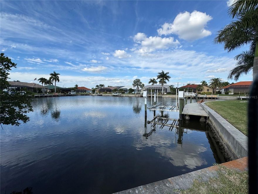 WATERFRONT LOT IN PUNTA GORDA ISLES! Sailboat water, just minutes to Charlotte Harbor! Build the Custom Home you’ve always imagined on this cul-de-sac lot. This property showcases a gorgeous wide-basin view along a deep-water, sailboat-access canal—offering quick, direct access with no bridges, and provides generous space for a large residence, pool, and outdoor living areas. 
PGI, (Punta Gorda Isles) offers concrete sea walls, maintained by the City of Punta Gorda, upscale homes, and an ideal setting for luxurious coastal living. Just minutes from Fishermen’s Village, outdoor parks, and sidewalks for leisurely walks and bicycling. Golfers will appreciate easy access to St. Andrews South Golf Club and Charlotte Harbor offers great boating, fishing, and water activities. This premium waterfront parcel is perfect whether you’re ready to build now or looking for an exceptional long-term investment.