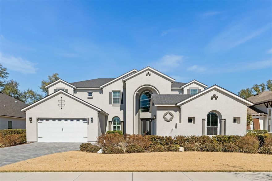 This is not just another Oakmont listing, it is the only Brooke model on the market, and it was built to stand apart. Positioned on a premium lot and enhanced with over $50,000 in upgrades, this home exudes sophistication at every turn. Set against a tranquil water backdrop, you have no rear neighbors behind you. The second you walk in, you are welcomed with cathedral ceilings, an open floor plan, and three levels of towering windows that perfectly frame the pond, making the view an integral part of the home’s design. Boasting five spacious bedrooms, 3.5 baths, a private study, and an upstairs loft, and 3 car garage, this home offers space to live, work, and play. Every detail has been thoughtfully curated from the upgraded quartz countertops, to the GE appliances (including a microwave and oven that doubles as an air fryer), to the gas stove with a pot filler and generous walk-in pantry. Upgraded LVP flooring flows throughout the first-floor living areas, complimented with tile in the wet areas. Custom window treatments enhance every  room, with plantation shutters at the front, app-controlled power blinds in the living room and primary bedroom and wooden blinds in the upstairs bedrooms.The primary suite is a true sanctuary with an oversized closet accessible from two entryways, an ensuite bath with double vanities and a walk-in shower framed with floor-to-ceiling tile and a stone-accented base with a built-in seat. Extra luxuries you will be sure to enjoy is the separate garden tub and private water closet. Upstairs, you will find two bedrooms on one side and an additional two bedrooms on the other end. One pair of rooms share a thoughtfully appointed Jack and Jill bath, while the other  features a  private guest bath, creating a balanced layout for family or guests. The loft is a unique space that the sellers had specifically walled off intentionally, creating an additional area of privacy. This area is perfect for a gym, media room, or playroom. Step outside to the screened-in lanai with stone pavers, extended 15 feet to create an even better outdoor experience. Beyond the home, residents enjoy the very best of Oakmont’s lifestyle amenities, including one of the largest residential pools, a fully-equipped fitness center, tennis and pickleball courts, basketball and volleyball courts, a playground, and walking and biking trails. Nature enthusiasts will love the unique Gopher Tortoise Nature Reserve with its 2-mile trail. This location has everything you would want or need, whether you’re looking for top rated schools, a quick commute to all major hospitals, or easy access to dining and shopping. Schedule your private showing today!