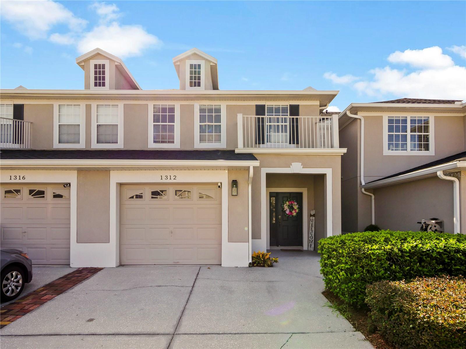 Welcome home!!! This beautiful townhouse is move in ready and waiting for you!! This townhome is one of the largest models in the community at 1,961 sq ft. featuring 3 bedrooms, 2 full bathrooms, one half bath and a spacious family room. The owner’s suite is located on the second floor with a beautiful spa-like bathroom with double vanities, garden tub, a fully renovated shower and His & Hers closets. Fantastic floor plan with a spacious kitchen boasts ceramic tile flooring, 42" wood cabinets, including all stainless-steel appliances – smooth-top range, built in microwave, dishwasher and refrigerator and a spacious pantry. The laundry room is conveniently located upstairs and includes the washer & dryer. Avalon Lakes is a gated community and has so much to offer from a resort-style swimming pool, playground, two gated entrances, the community HOA maintains your landscaping and building exterior which is included in the monthly fee. Close to top A-rated schools and is conveniently located next to downtown Avalon Park, AKA America’s hometown community where a variety of banks, urgent care facilities, Starbucks, pharmacies, shops, restaurants, and entertainment venues can be found. Also, just minutes to Waterford Lakes Town Center, UCF, and major toll roads like 408, 417, and 528 with easy access to the Int’l Airport. Make this stunning traditional Florida home yours today!