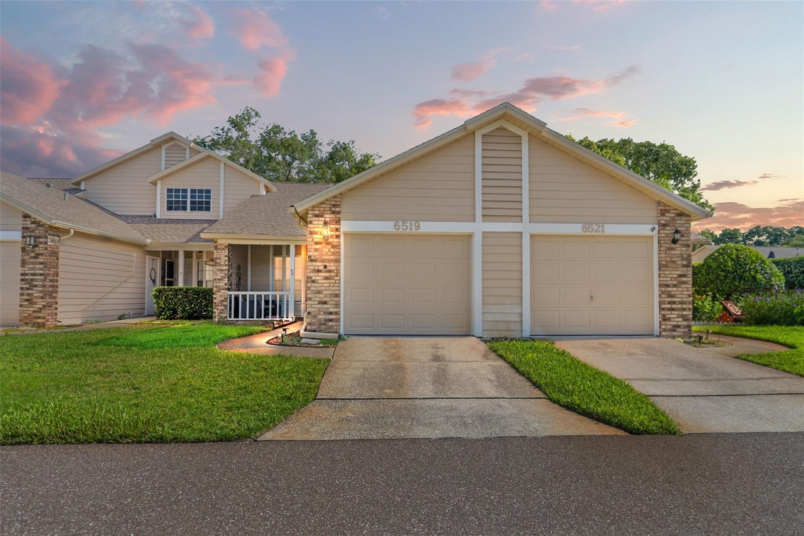 WELCOME TO THIS CHARMING UPDATED Villa in Briar Patch at 6519 Thicket Trail located Only Steps from the Club House & Community Pool. This Desirable 55+ Community (One Person to be at least 55 Years old - Minimum Age is 30 Years old for additional) is in the Fun Filled City of NEW PORT RICHEY... Downtown Music & Art Festivals, Farmer's Market, Sims Park, Cote River, Aquatic Park... So Much to Do & See. What Makes this Villa Special? The Location Near the Club House & Community Pool .. Do Not need to use the Additional Parking for the Pool as it is a Short Walk.. 2nd Villa to the Left. And this Villa has a Zero Entry Walk in Shower with a Handle Bar. Let's Start in the Front.. Front Covered Porch with Bay Window. Walk into a Soaring Vaulted Ceiling with Skylight to give the Home an Open Naturally Bright Floor Plan plus Luxury Vinyl Flooring Throughout. Step in Further to an Enclosed Florida Room with Shelving that has AC & Heat to give the Home Additional Living Space. The Kitchen is Quite Lovely with Plantation Shutters, White Shaker Cabinets, Quartz Counters, White Farmer's Sink with Wand Faucet, Breakfast Bar & Stainless Steel Appliances. Primary Bedroom offers a Sliding Glass Door into the Florida Room, Walk in Closet & Updated Vanities & Walk In Shower. Plantation Shutters are in both the Primary Bedroom and the Guest Bedroom. Washer & Dryer stay with the home & are located off of the hallway near the Guest Bedroom & Bathroom. The Guest Bathroom is a Tub/Shower Combo. 1 Car Garage that comes with a Tool Chest & Cabinet (19.5 ft x 13 ft) 2024 Roof, 2021 Trane HVAC with a 10 Year Warranty + 2-3 Year Old Water Heater. HOA is VERY AFFORDABLE at $215/Month & Covers quite a bit: Lawn Care (Mowing, Edging, Trimming Bushes, Fertilizing & Spraying for Pest), Sprinkler Care & Irrigation, Garbage, Exterior Paint, Roof (which was just put on last year). Great Location, Nice Neighborhood, Affordable.. Perfect for Snowbirds or to Make it your Retirement Home.. Come See.