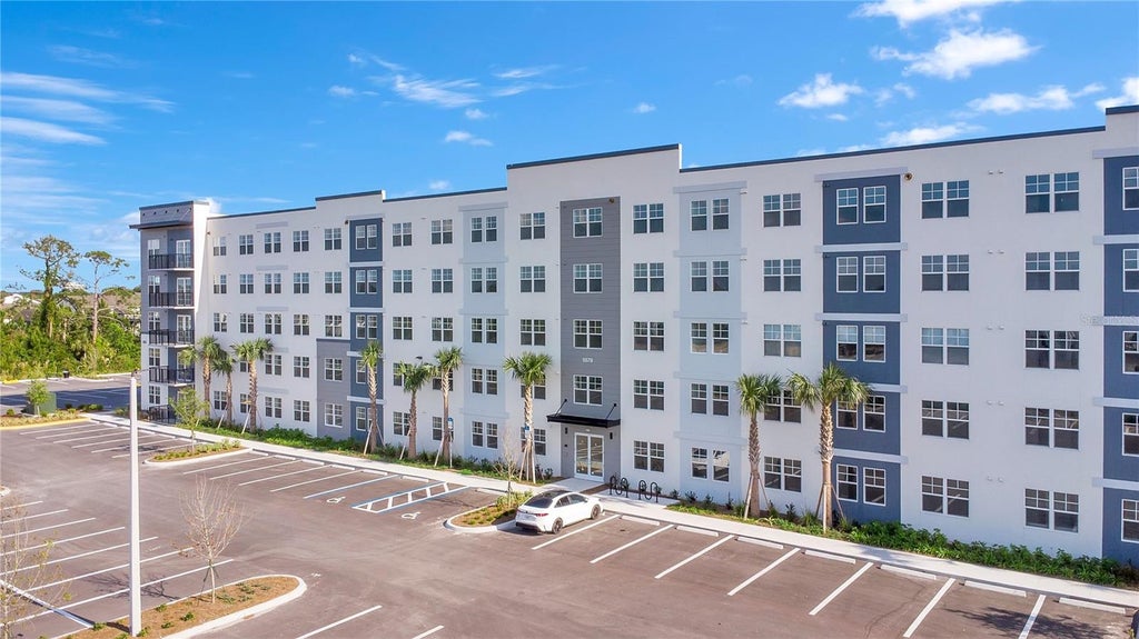 Photo of 5579 Millenia Park Boulevard #222, Orlando, FL 32839 (MLS # O6412194)