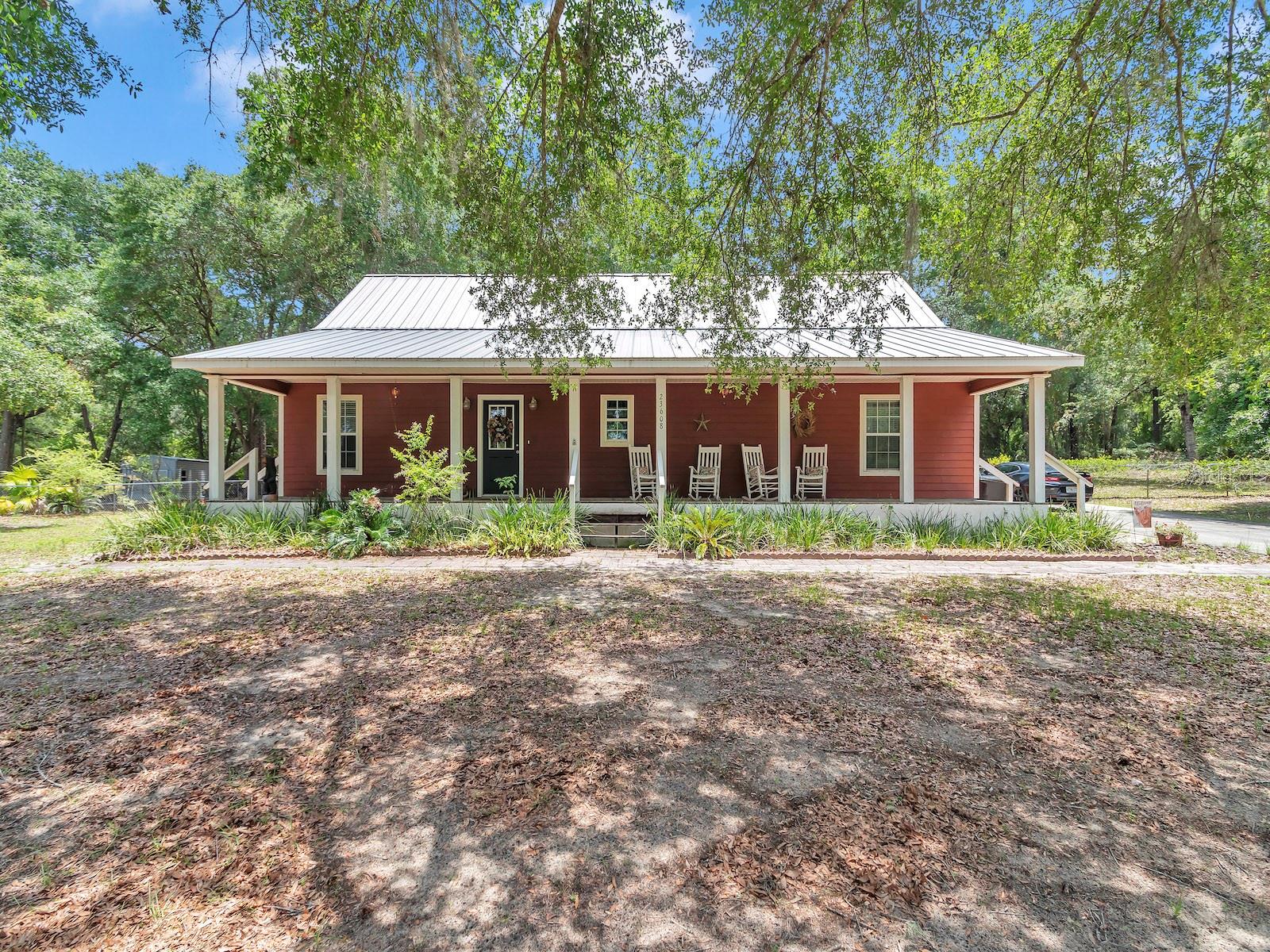 Gorgeous Ranch-Style Home in Gated Lake Kerr(Ker South) Community
3 Bed | 2 Bath | 1 Acre Lot | Built 2003 | Access to Lake Kerr
Welcome home to this beautiful ranch-style residence nestled in the desirable gated waterfront community of Ker South, just south of downtown Salt Springs. This charming neighborhood offers exclusive access to Lake Kerr with a private dock and boat ramp, and features large parcels (1–3+ acres) with only site-built homes, preserving the serene, private atmosphere of this nature-lover’s paradise.
Set on a spacious 1-acre lot, this custom-built 2003 home by Jeff Penuel greets you with picturesque views of open country fields and timeless curb appeal. The home features full-length covered front and back porches—perfect for rocking chairs and peaceful morning coffee—and a durable metal roof for long-term protection.
Inside, you’ll find a thoughtfully designed floor plan with cathedral ceilings, laminate and carpet flooring, and an open layout ideal for entertaining. The spacious primary suite includes a large en suite bath and ample closet space. The kitchen is a highlight, with custom wood cabinetry, extensive storage, laminate countertops, a breakfast bar, and all appliances included.
Additional features include:
3 Bedrooms / 2 Bathrooms
Open-Concept Living & Dining
Vaulted Ceilings & Abundant Natural Light
Laundry/Utility Room with Extra Storage
Covered Front & Back Porches
1 Acre of Land with Room to Expand
Gated Community with Lake Access, Boat Ramp & Dock
Located in the heart of the Ocala National Forest, this property is minutes from the Salt Springs Recreation Area, known for its crystal-clear springs, boat launch, and family-friendly swimming. You’ll also enjoy miles of ATV, horseback, and hiking trails, and year-round fishing and hunting in the area’s lakes, rivers, and forest ponds.
Just 10 minutes to downtown Salt Springs for grocery, gas, pharmacy, and restaurants. Only 30 minutes to Ocala or Palatka, and about 50 minutes to Gainesville.
Lake Kerr is a pristine, spring-fed, 2,800-acre lake and the second-largest lake in Marion County. It connects to Little Lake Kerr (Lake Werner) and offers some of Central Florida’s best fishing—bass, bream, specks, catfish, and more. Its unique shoreline creates perfect conditions for watersports, tubing, kayaking, and boating, with scenic spots like Kaufman Island and a public ramp at Morehead Park.
This is a rare opportunity to own a move-in-ready home with private lake access in a quiet, gated community surrounded by nature. Schedule your showing today and start living the Salt Springs lifestyle!