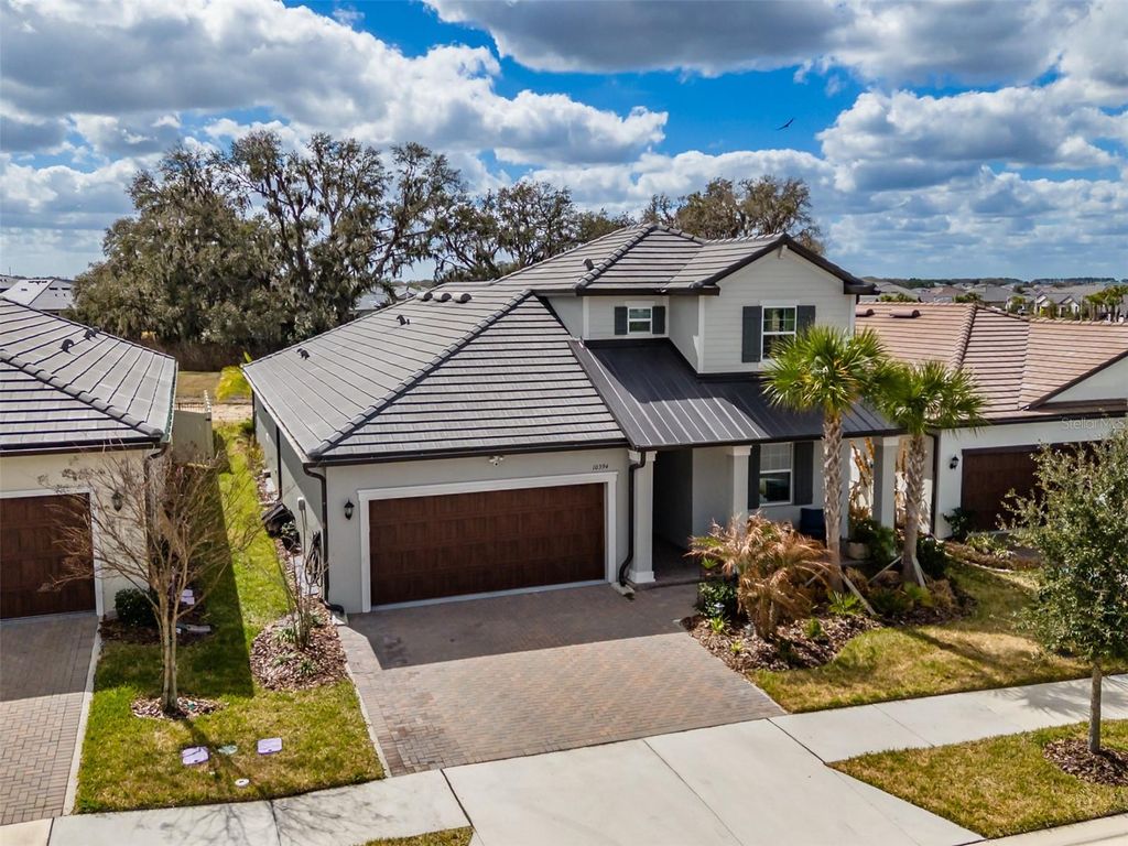 Photo of 10394 Tupper Cay Drive, San Antonio, FL 33576 (MLS # W7883273)