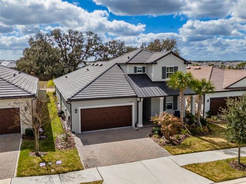 Photo of 10394 Tupper Cay Drive, San Antonio, FL 33576 (MLS # W7883273)