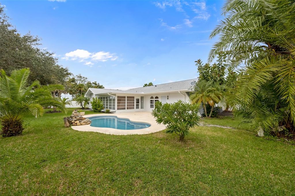 Photo of 914 Waialae Circle NE, Palm Bay, FL 32905 (MLS # O6354665)