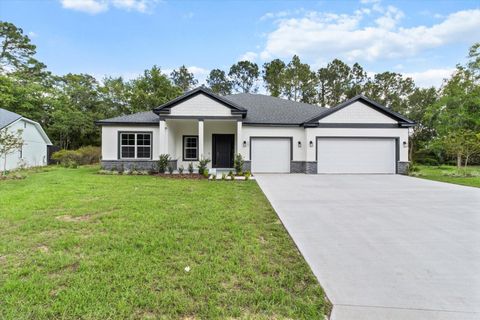 Photo of 136 N James Place, Groveland, FL 34736 (MLS # O6316205)