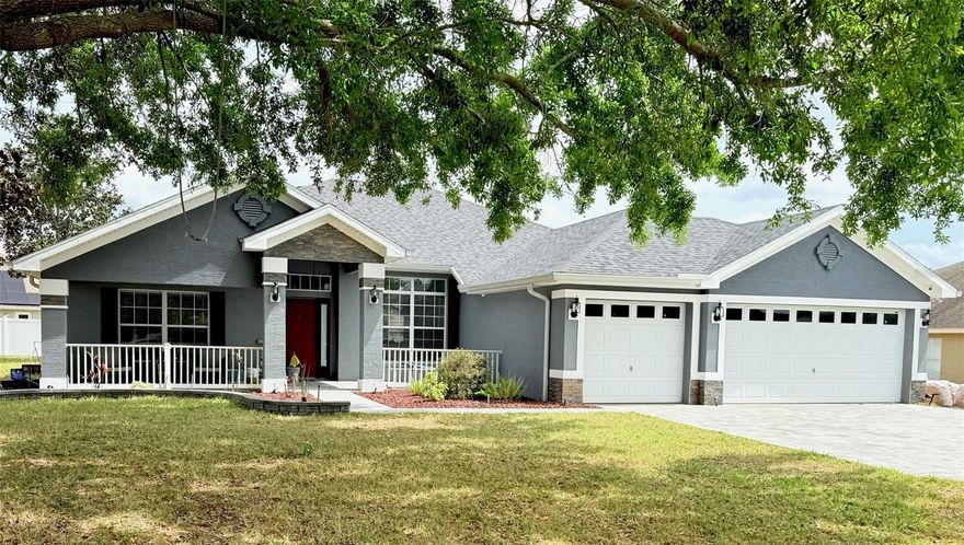 This move-in-ready 4-bedroom, 3-bath open-concept home is located on a extra-large corner lot connected to a dead-end road. A new 3D single roof, still under warranty, provides added value, along with rain gutters around the entire exterior. The home was freshly painted on the exterior and features veneer stone accents for enhanced curb appeal. Belgian block pavers on the driveway and porch add a polished finish.

Inside, the open layout is complemented by upgraded light fixtures and ceiling fans throughout. The kitchen and bathrooms showcase white quartz countertops and ceramic tile flooring throughout the home, paired with engineered wood accents on all interior walls. All bathrooms are complete with glass shower doors, offering a modern, finished look.

This well-maintained property combines quality upgrades, modern design, and the advantage of a spacious corner lot can be all yours!