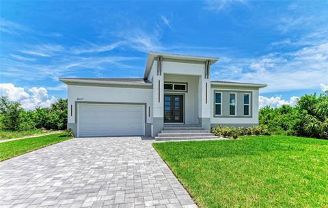 Photo of 8147 Tracy Circle, Port Charlotte, FL 33981 (MLS # N6144332)