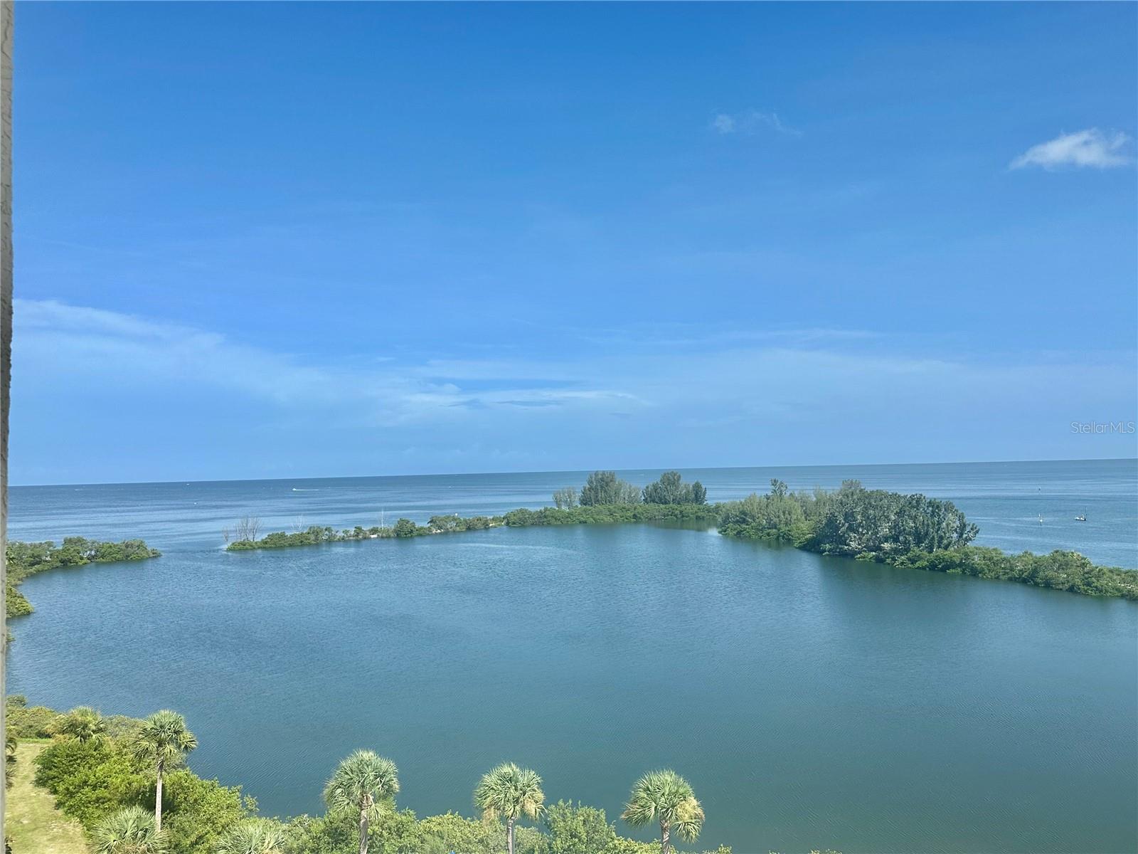 JAW DROPPING 7TH FLOOR WATER VIEWS! Staying here on Gulf Island you will enjoy watching the Gorgeous Summer Sunsets, dolphins play, manatee float and birds soar by from your own private covered balcony. This beautiful condo features 2 onsuite bedrooms and is offered fully furnished and equipped for your upmost pleasure. Both the living room and master bedroom offer oversized 8 ft sliding doors onto the balcony with awesome views and relaxing Gulf breezes. The unit also includes an in unit washer /dryer which alot of condos do not have. It features newer high impact slilding doors providing quiet, energy efficiency, and storm protection for your comfort with additional storm protection from the sliding metal hurricane shutters front and rear. Relax in the olympic size heated pool or on the private sandy beach overlooking the picturesque lagoon. Play and exercise in the clubhouse game rooms and waterfront fitness center. The community is "Nature's Paradise" surrounded by water with 24/7 guarded and gated entrance for your upmost security. Ideally located in quiet Hudson, close to multiple beaches and parks, restaurants, golf courses, the SunWest AquaPark, and all that the Tampa Bay and St Pete/Clearwater areas have to offer both day and night. Please view the attached virtual tour of the community Nature's trail, beach, pool, and clubhouse. Call today! Don't you deserve the "Good Life"? Rates vary depending on length of stay and time of year. $2900 a month is an off season . Not Available Dec 24 2024 to March 30 2025 Call for more details
