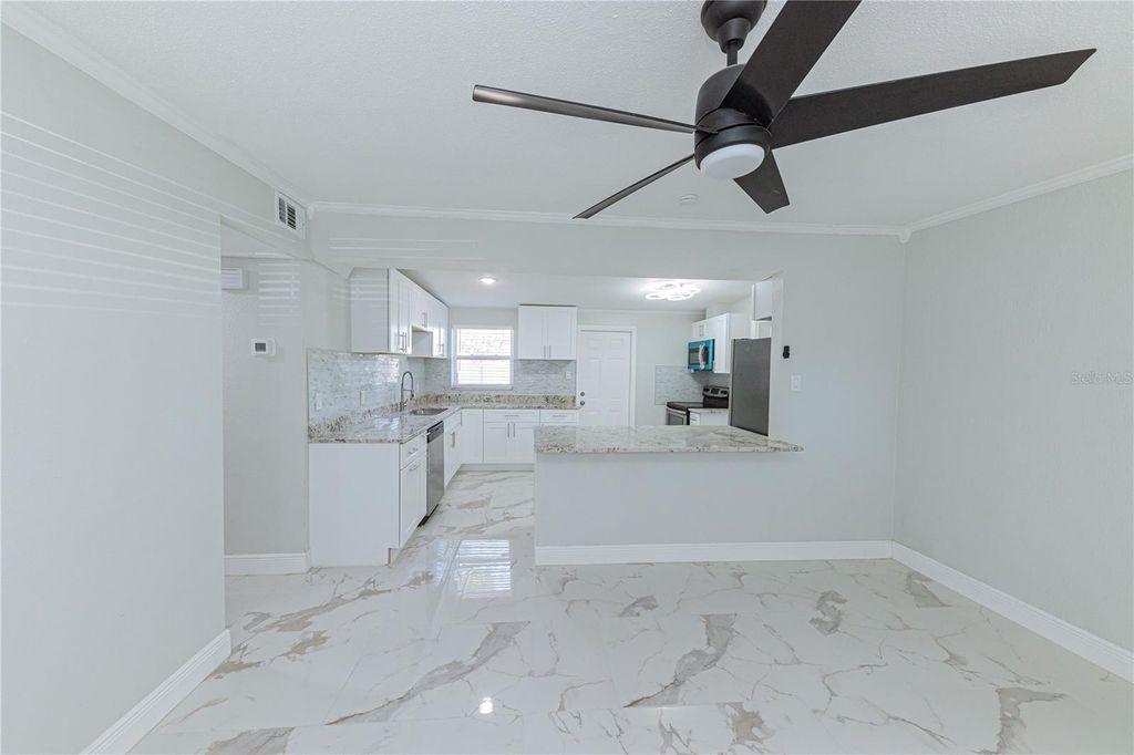 Photo of 8717 91st Terrace, Seminole, FL 33777 (MLS # TB8491938)