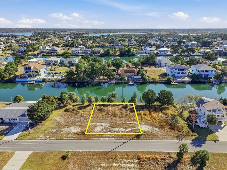 A rare opportunity to create your own waterfront resort in Hernando Beach. Imagine designing a private coastal retreat across three waterfront lots in the heart of Hernando Beach — a space where every day feels like a getaway. Whether your vision is a luxury personal resort, a multi-home compound, or a high-end investment property, this opportunity offers the space and setting to truly build something special. This buildable waterfront lots offer indirect access to the Gulf of America via a boat lift, making it easy to enjoy boating, sunsets, and the laid-back waterfront lifestyle Hernando Beach is known for. As a golf cart community, getting around is simple and fun — with local restaurants and shops just minutes away. And when you’re ready to explore beyond the neighborhood, you’re only about 15 minutes from Pine Island Beach and Weeki Wachee Springs, giving you quick access to some of Florida’s most beautiful natural destinations.
Opportunities to create something this unique don’t come around often. If you’ve been dreaming of building a true waterfront escape — one that blends space, privacy, and coastal charm — this might be exactly what you’ve been waiting for.