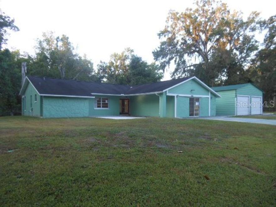 Welcome to the Well Established Candlelight Village Community in the Heart of Brooksville. Built in 1984 this solid Ranch Style stucture is Concrete Block and Stucco. This is the Perfect Base to Build Your Perfect Living Space. The Home shows signs of deferred maintenance and is priced accordingly to invite the savvy investor or the homowner that wants to install interior finishes to suite a more modern lifestyle. You will find a versitile floor plan with a Functional Kitchen that is Open to the Family Room that leads to the Screened Back Porch, A Living Dining Area that opens to the Screened Back Porch, and a Garage Conversion Perfect for a Game Room, Media Room, or Man Cave. The Oversized Lot Features a Patio with Fire Pit/Cooking area and a Spacious Multicar Garage. Convient to Shopping, Dining and Main Highways: 589 Suncoast Parkway, Hwy 41, and I 75. No HOA or CDD and no through traffic. Make this place your Special Living Space.