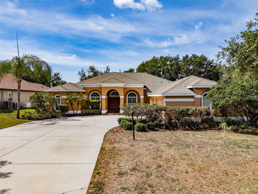 One or more photo(s) has been virtually staged. This is a rare, one-story 3,356 sq ft home with 5BR, 3BA and a bonus room. Built by Sunrise Homes, the kitchen features lots of cabinets and countertop space, a work island and pendant lighting. The breakfast nook offers mitered windows overlooking the lanai. The family room is open & airy boasting a TV niche that is surrounded by columns and there is plenty of natural light with the floor to ceiling windows and the french doors that lead to the pool. The formal dining room and living room features coffered ceilings & crown moulding and the living room features french doors that open to the lanai. The large primary suite has a coffered ceiling, a walk-in closet and a custom built-in closet. The En-suite offers his & her vanities, a soaking tub, and a walk-in shower. The secondary bedrooms are spacious. Two bedrooms offer a Jack-n-Jill bathroom and the 5th bedroom  has french doors and is perfect for an office or den. There are plenty of possibilities for the huge bonus room located in the back of the home.  The refreshing pool is the place to be on the warm days and the extended lanai is the perfect spot for your evening cocktail and cook-outs. The laundry room offers a laundry sink. The main AC was replaced in 2023. New pool pump in 2025 and the pool offers LED lighting. Fresh exterior and interior paint. The extended driveway leads to the 3-car oversized, side entry garage. Add a couple of rocking chairs to the brick pavered porch and you have the perfect spot for your moring coffee.  The back yard has a PVC privacy fence. This home offers plenty of space for family, friends and entertaining and is nestled on an oversized lot at the end of the cul-de-sac. Located minutes to shopping, dining, the YMCA, Little League fields, and schools. Bloomingdale High school is walking distance.