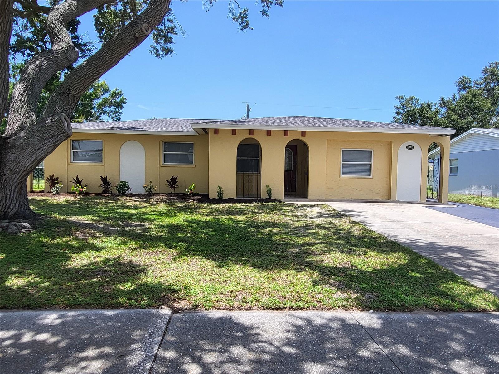 Seaside Living Just Minutes from the Beach! Welcome to your perfect coastal retreat! This beautifully maintained, possible 4-bedroom, 2-bathroom POOL home is truly move-in ready and ideally located just a FEW MILES from some of America's top-rated BEACHES.
From the moment you arrive, you’ll appreciate the extended driveway, perfect for your boat or RV, along with fresh landscaping and a freshly pressure-washed exterior that adds to the home’s curb appeal. Step inside to a warm and welcoming interior featuring a neutral color palette, ideal for any decor style. The layout offers BOTH a spacious LIVING ROOM and a separate FAMILY ROOM, creating plenty of room to relax and entertain. The EAT-IN-KITCHEN is the heart of the home, featuring GRANITE countertops, STAINLESS STEEL appliances, abundant cabinet space, and natural light streaming through the over-the-sink window and French doors. The French doors lead you to a SCREENED-IN PATIO overlooking your private IN-GROUND POOL and FENCED-in backyard, the perfect spot for enjoying Florida’s year-round sunshine! To the right side of the home, you'll find a generous laundry room with ample storage, as well as a versatile bonus room that can be used as a 4th bedroom, home office, or den. On the opposite side, the primary bedroom and bathroom complemented by two additional bedrooms and a second full bathroom. Enjoy added peace of mind with recent key upgrades, including: New Roof (2023), AC System (2016), Hot Water Heater (2016), Meter Box & Electrical Panel (2017).
Outdoor enthusiasts will love the proximity to Wellfield Park, featuring soccer, football, baseball, batting cages, croquet, and a 9-hole disc golf course. Also nearby is Bypass Park/Foxworthy Campus, a 38-acre recreational haven offering softball, tennis and pickleball courts, and soon to be: 3 brand-new lighted pickleball courts and a fantastic playground. And for boaters-Gulf access is just minutes away at the nearby public ramp! This home combines comfort, convenience, and coastal charm, all in a location that can't be beat. Don’t miss this opportunity to live the Florida dream!
