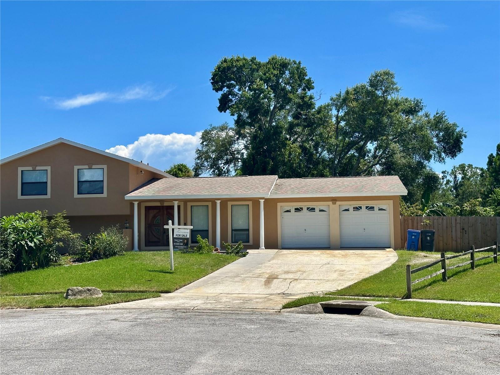 Have a large or a growing family look no further this is the one. Amazing 4-bedroom, 3 full baths, 2 car garage tri-level home with an inground pool, No back neighbors for privacy. Home backs up to The Town & Country Greenway great for family walks or biking. Large back yard with fruit trees mango, lime, guava, bananas and a growing loquat. Wait there's more yard is large enough if you need room for an in-law suite, camper or just some toys without having to worry about HOA. New exterior and interior paint, new ceramic tile floors throughout, carpets in the upstairs bedrooms. Updated kitchen with new granite counter tops open floor plan great for entertaining. Updated bathrooms, new roof and AC in 2020, electric was also updated. Home is centrally located close to Tampa International Airport, Ramond James, Beaches and Downtown Tampa. So, after work take a plunge in your pool and cool off during these extremely hot times. Home sits on the hill at the end of the cul-de-sac. Oh, wait there's even a side yard for the pups to enjoy, this is a truly must see.