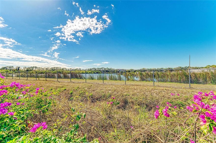 Whether you are searching for your new forever home, or simply a winter retreat, welcome to this desirable 2 Bedroom / 2 Bathroom first floor Morton Village condominium.  This unit is located at the back of the community with a view over a pond bordered by wildflowers where birdlife likes to congregate.  Here you will enjoy resort-style amenities with 2 pools (one heated), clubhouse, shuffleboard, and more. Morton Village is a desirable 55+ community in the heart of Bradenton, less than 8 miles to the white sandy beaches of Anna Maria Island, Sarasota Bradenton Airport, and mere minute to plenty of dining and shopping (including the local favorite Detweilers Farm Market® within a 10 minute walk! The IMG Academy is just down the block and there are multiple golf courses available within 10 miles.  After you get situated with your surroundings, you will enjoy coming home to the well-maintained condo and vibrant community.  The home has a large kitchen with plenty of cabinetry, a large Living Room with plenty of room to spread out.  Both bedrooms are large enough to accommodate a king-sized bed and the Primary Bathroom has been updated with an easily accessible shower.   You can watch the sunrise with your favorite morning beverage from your large lanai and get ready for that busy day.   The spacious laundry room has plenty of additional storage.  Condo fee includes water, sewer, trash, cable, internet, grounds and exterior maintenance - so come down to appreciate this must-see Florida retreat!