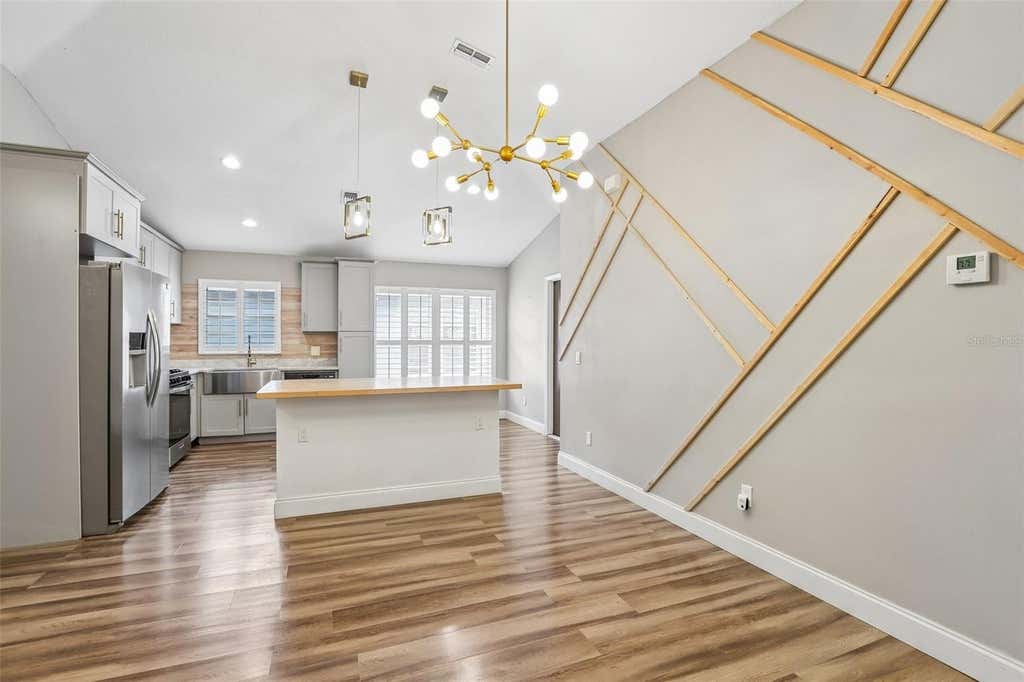 Photo of 8711 Busch Oaks Street, Tampa, FL 33617 (MLS # TB8534237)