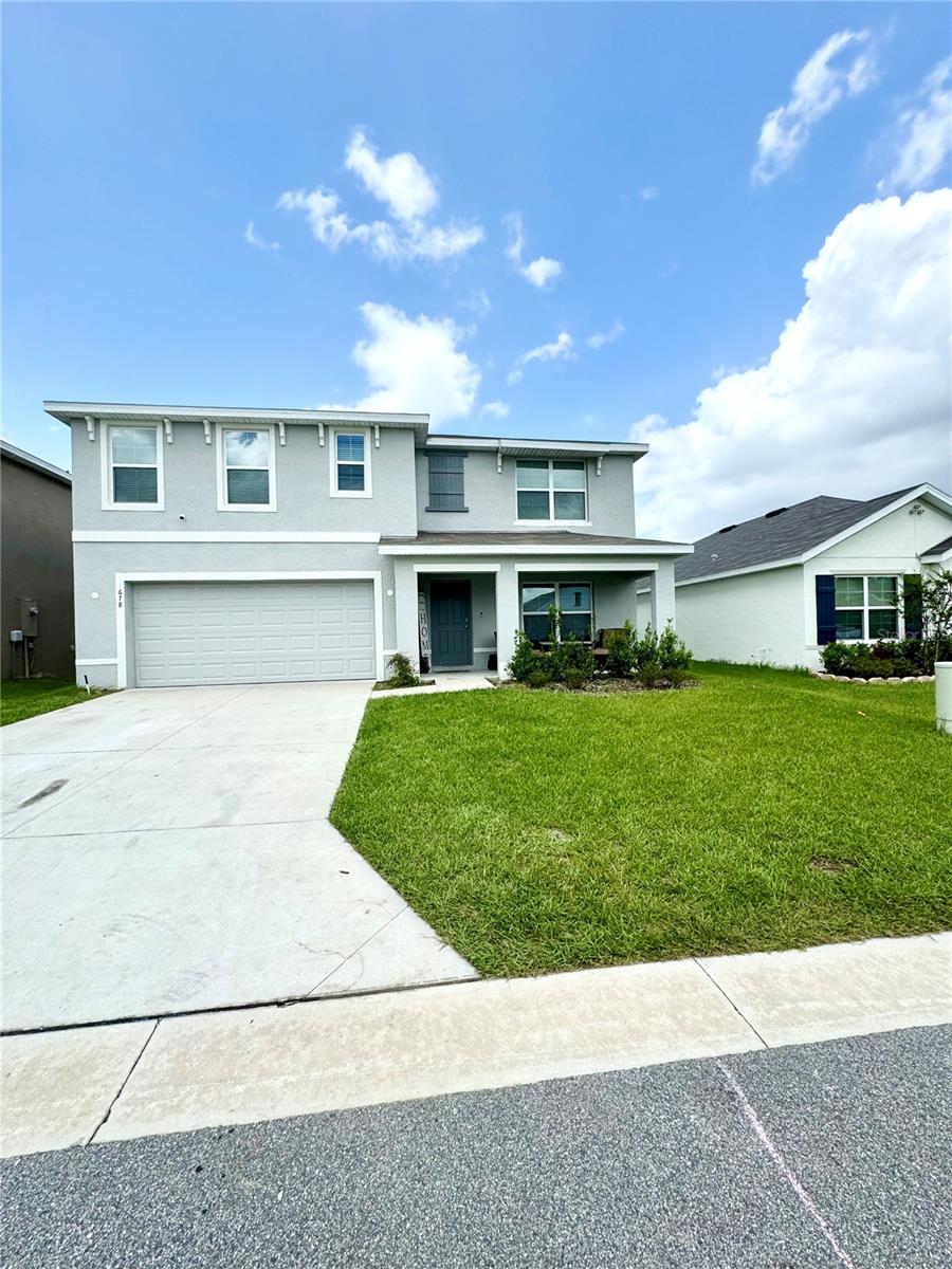 This beautiful all concrete block constructed, two story layout is perfect for a family who is ready to settle down and create everlasting memories. This beautiful home boasts of a large open-concept downstairs with a kitchen overlooking the living and dining room. The first floor also features a flex room that provides an area for work or for play, a bedroom, full bathroom, and an outdoor patio. The second floor includes the expansive Bedroom 1, three additional bedrooms that surround a second living area, a third full bathroom, and a laundry room equipped with a washer and dryer. Do not hesitate to make this place your home.