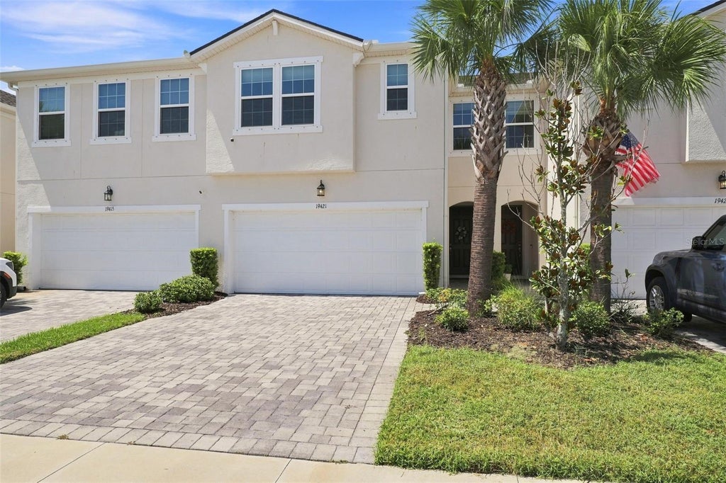 Photo of 19421 Monarch Wind Way, Lutz, FL 33558 (MLS # W7888942)