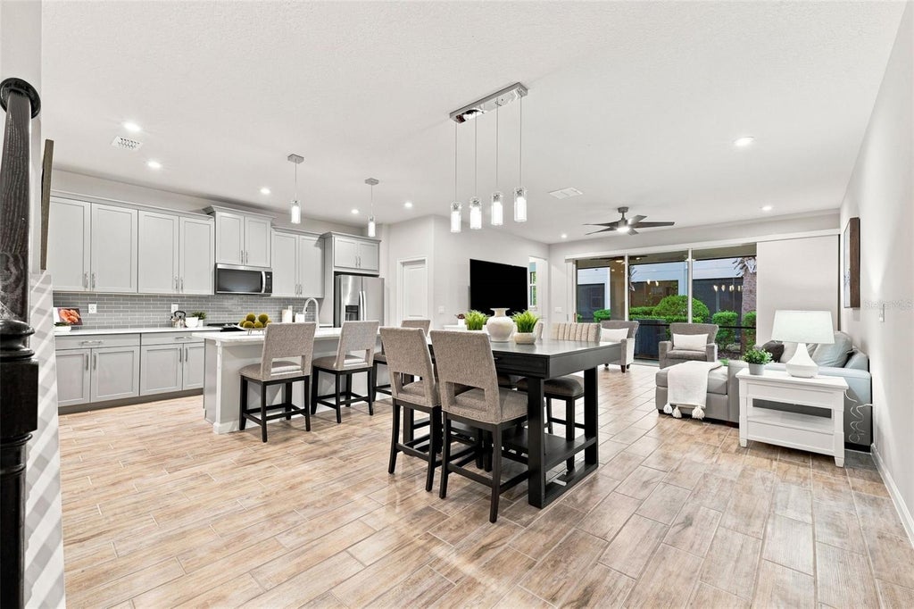 Photo of 19421 Monarch Wind Way, Lutz, FL 33558 (MLS # W7888942)