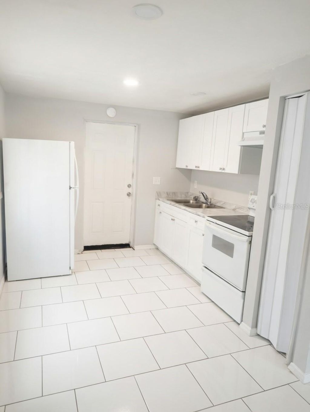 Photo of 5204 N 45th Street #A, Tampa, FL 33610 (MLS # TB8493444)