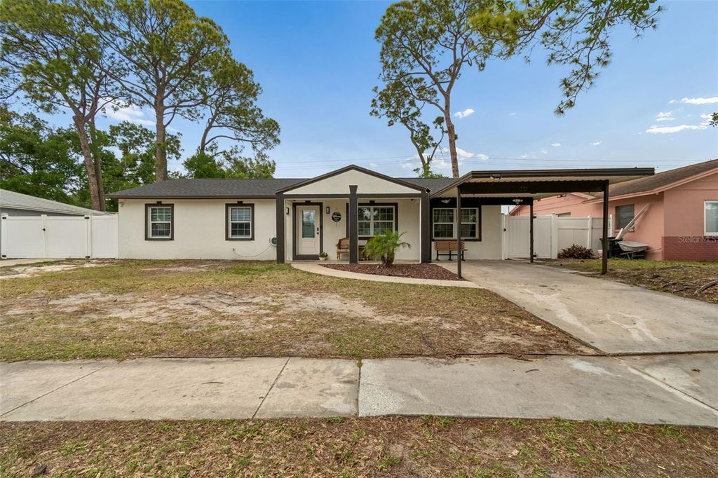 Photo of 7705 Jackson Springs Road, Tampa, FL 33615 (MLS # W7884616)
