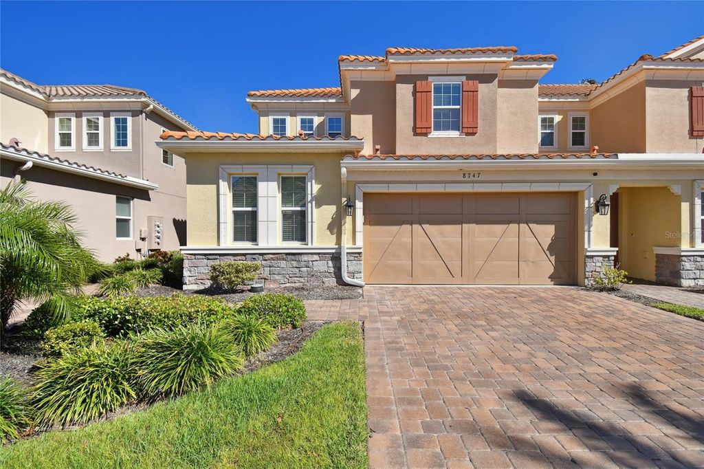 Photo of 8747 Terracina Lake Drive, Tampa, FL 33625 (MLS # TB8418661)