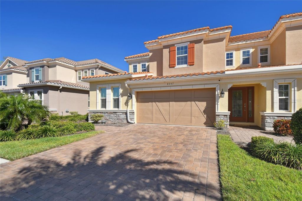 Photo of 8747 Terracina Lake Drive, Tampa, FL 33625 (MLS # TB8418661)