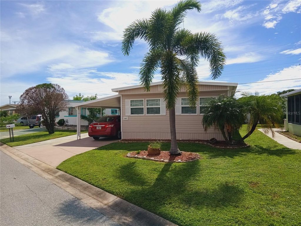 Photo of 5007 Boca Raton Avenue, Sarasota, FL 34234 (MLS # A4666021)