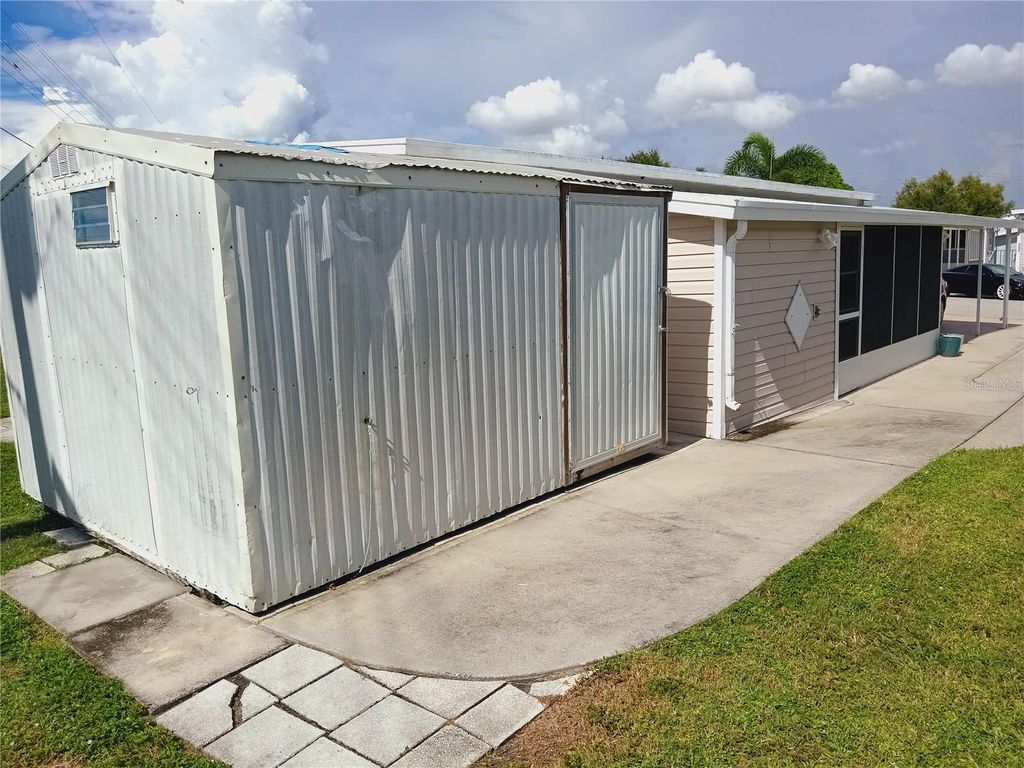 Photo of 5007 Boca Raton Avenue, Sarasota, FL 34234 (MLS # A4666021)