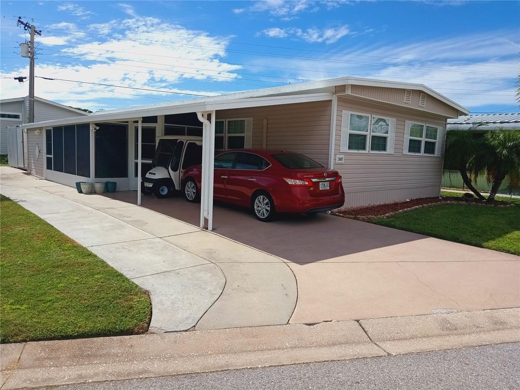 Photo of 5007 Boca Raton Avenue, Sarasota, FL 34234 (MLS # A4666021)
