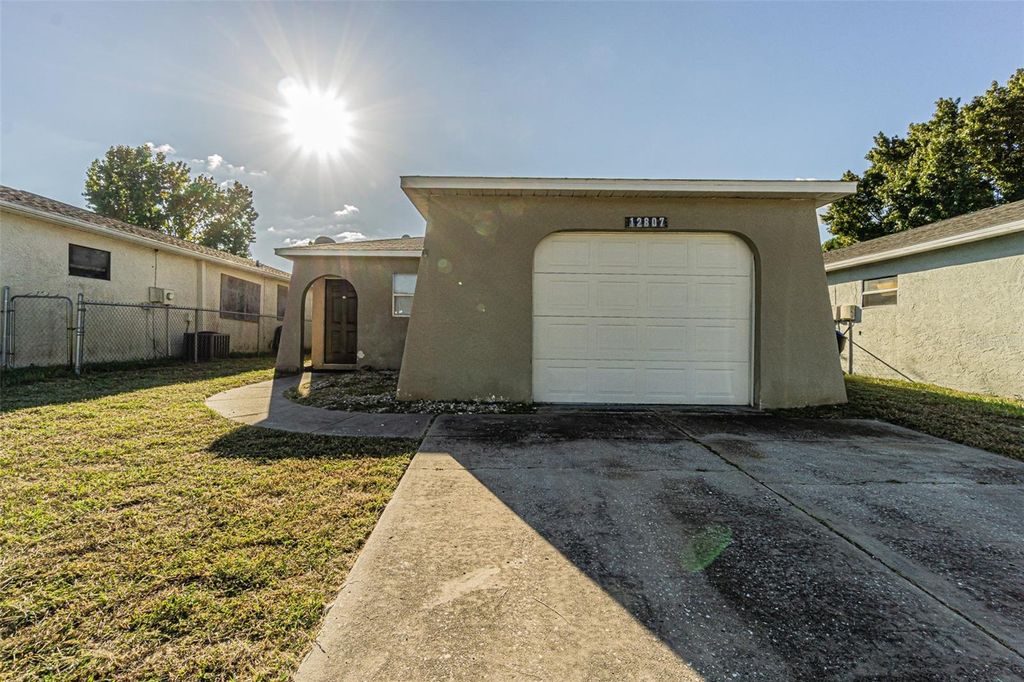 Photo of 12807 Kellywood Circle, Hudson, FL 34669 (MLS # O6378771)